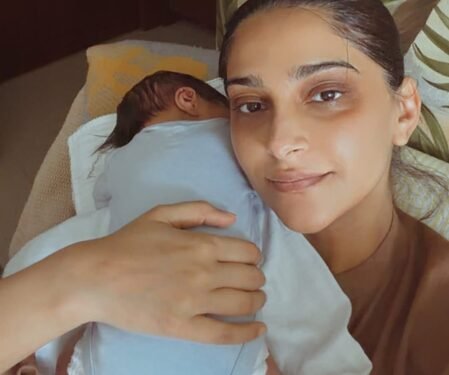 Sonam Kapoor flaunts her dark circles as she lovingly holds her newborn son