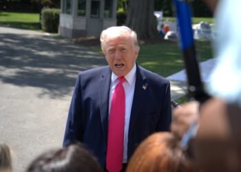 Trump warns Iran, says talks underway