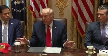 Trump says will not rush into Iran deal over midterm concerns