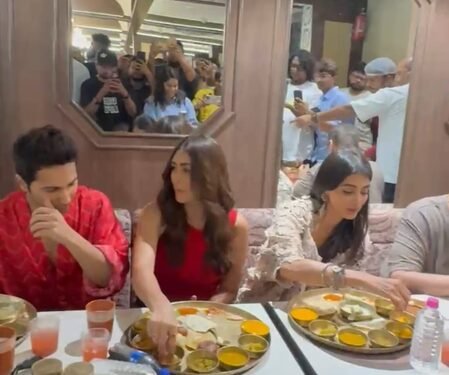 Varun Dhawan feeds Mrunal Thakur & Pooja Hegde as the three enjoy a delicious thali in Ahmedabad