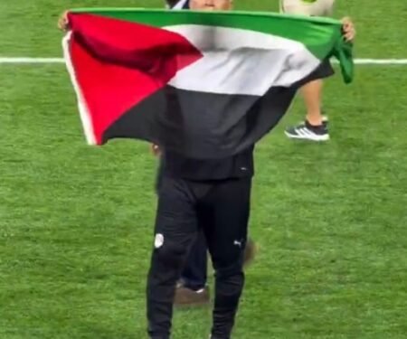 Egypt coach raises Palestinian flag after his side’s first knockout win at a FIFA WC