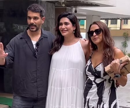 Karishma Tanna asks paps to stop focusing on her baby bump as she poses with Neha Dhupia, Angad Bedi