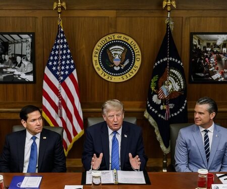 Trump touts record gains at Camp David