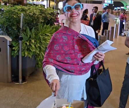 Kajol cuts birthday cake with paps at airport, shy Nysa Devgn stays out of frame