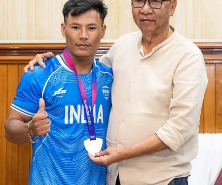 Manipur CM felicitates Commonwealth Games silver medallist Rishikanta Singh