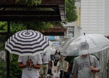 At least six dead as torrential rains trigger widespread flooding in Japan