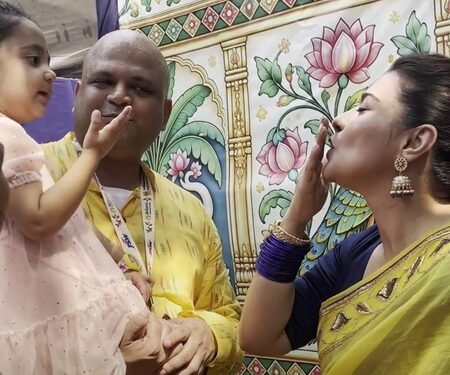 Kajol mingles with little girl, serves bhog to devotees at Durga Puja pandal, calls it ‘Family, Bhakti and Bhog’
